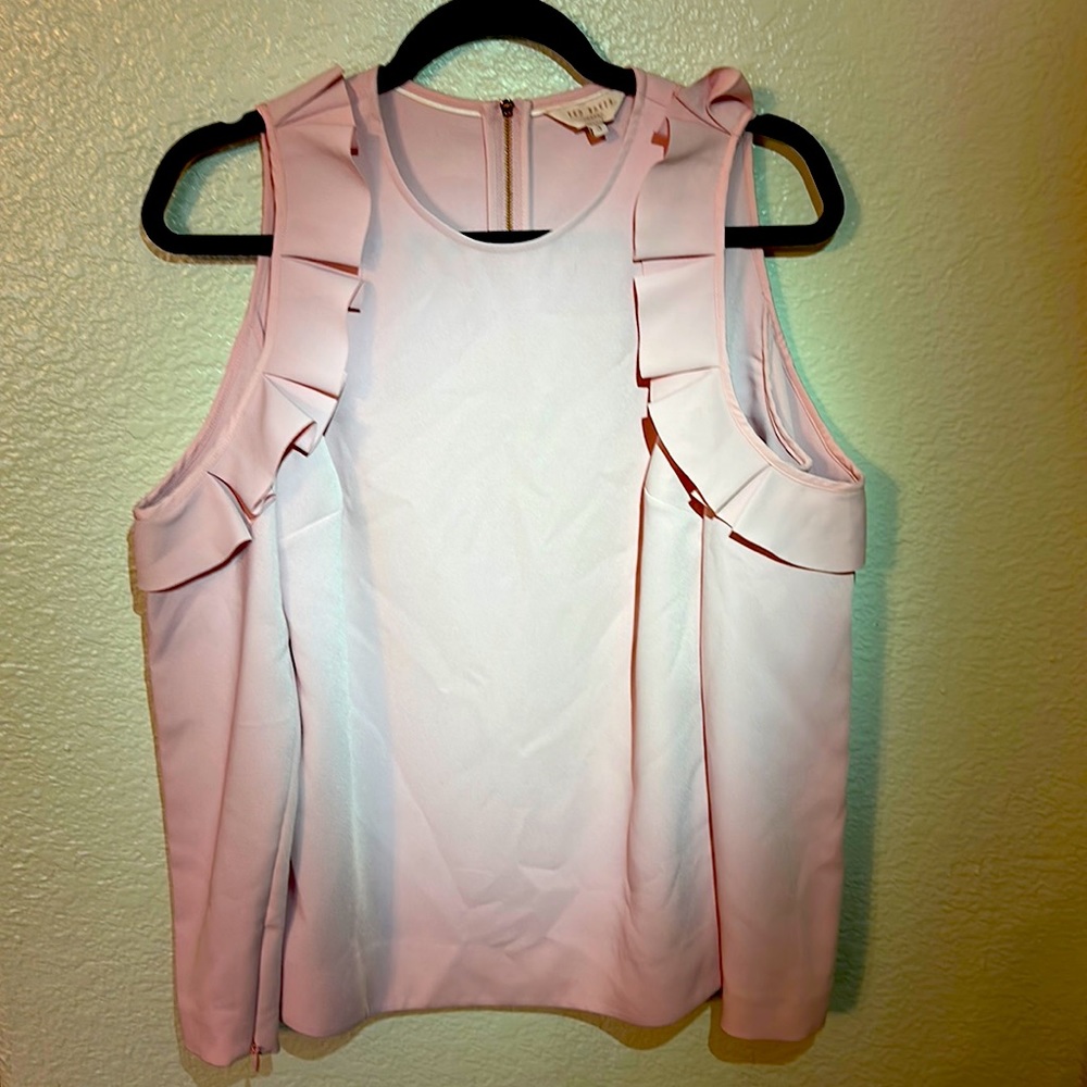 NWOT. Woman’s pink Ted Baker sleeveless top. Is ruffled around shoulders. Size 3
